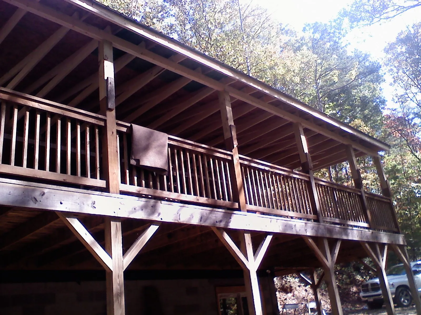 Timber framing under a new elevated porch and deck — Roof Leak Repair in Mcdaniel by Roofing Brothers